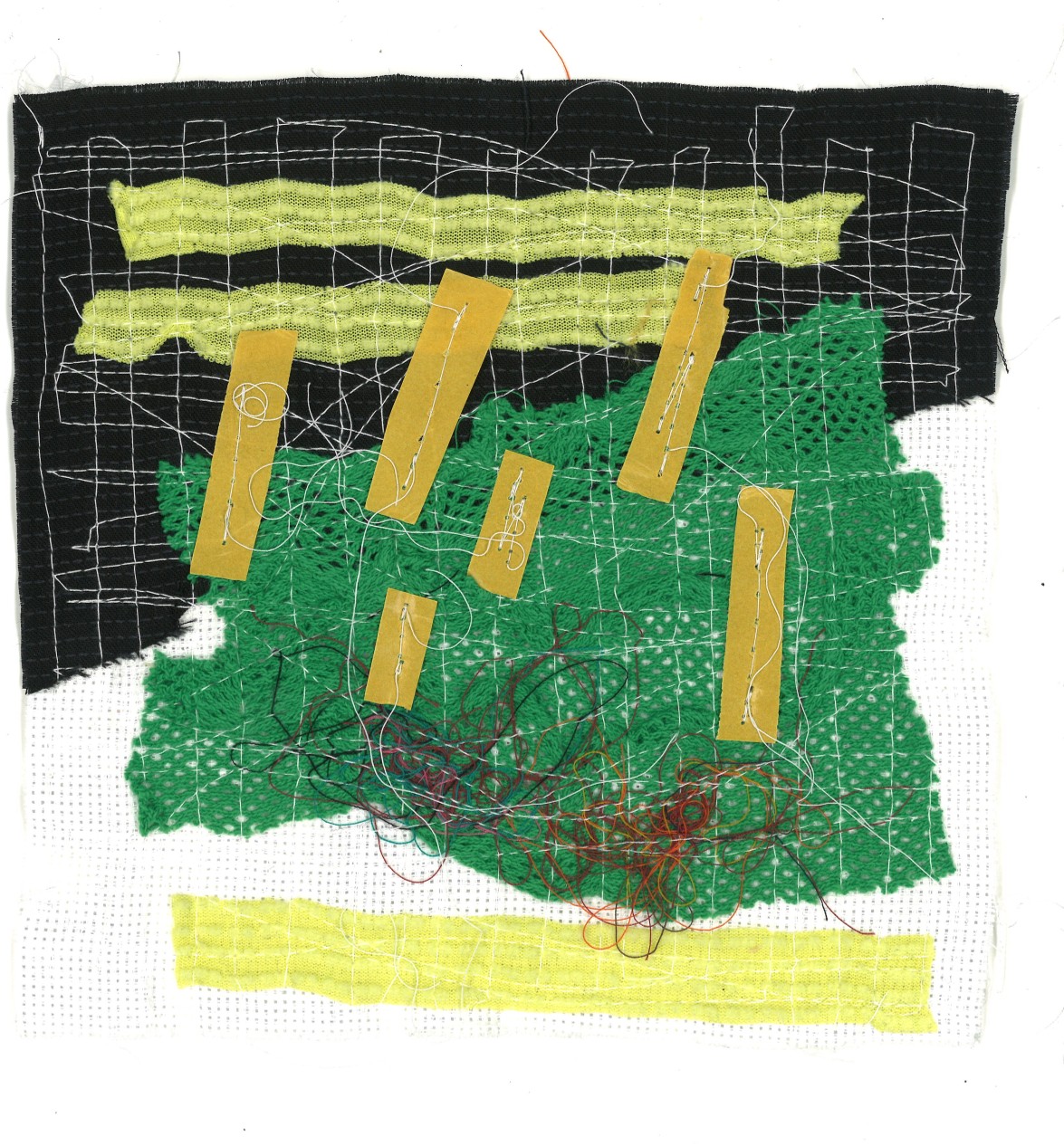 Textile collage made of black, white, and green fabric pieces, yellow strips, stitched-on cardboard pieces, and loose threads.
